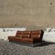 Three-seater canapé in brushed aluminium and brown leather, France, 1970.