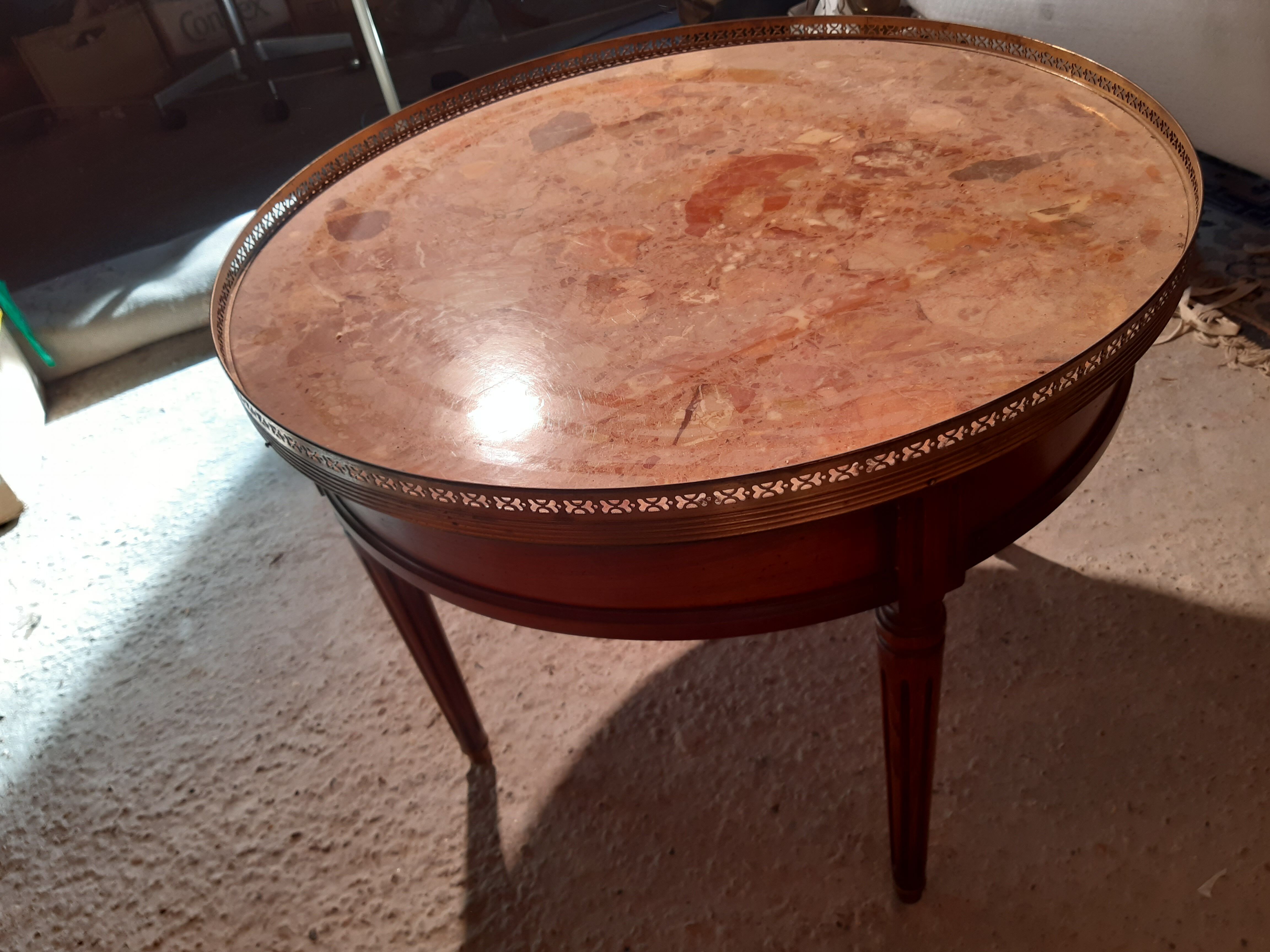 Marble and cherry hot water bottle table