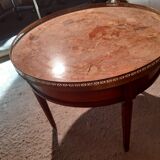 Marble and cherry hot water bottle table