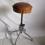 Vintage rotating stool seated in leather and chrome legs