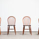 Série de 4 chaises scandinaves à dossier baton 1960