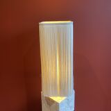 Beige marble stucco base, Houles white ecru fringed lampshade.