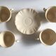 4 cups set in ivory faience from Sarreguemines to godrons