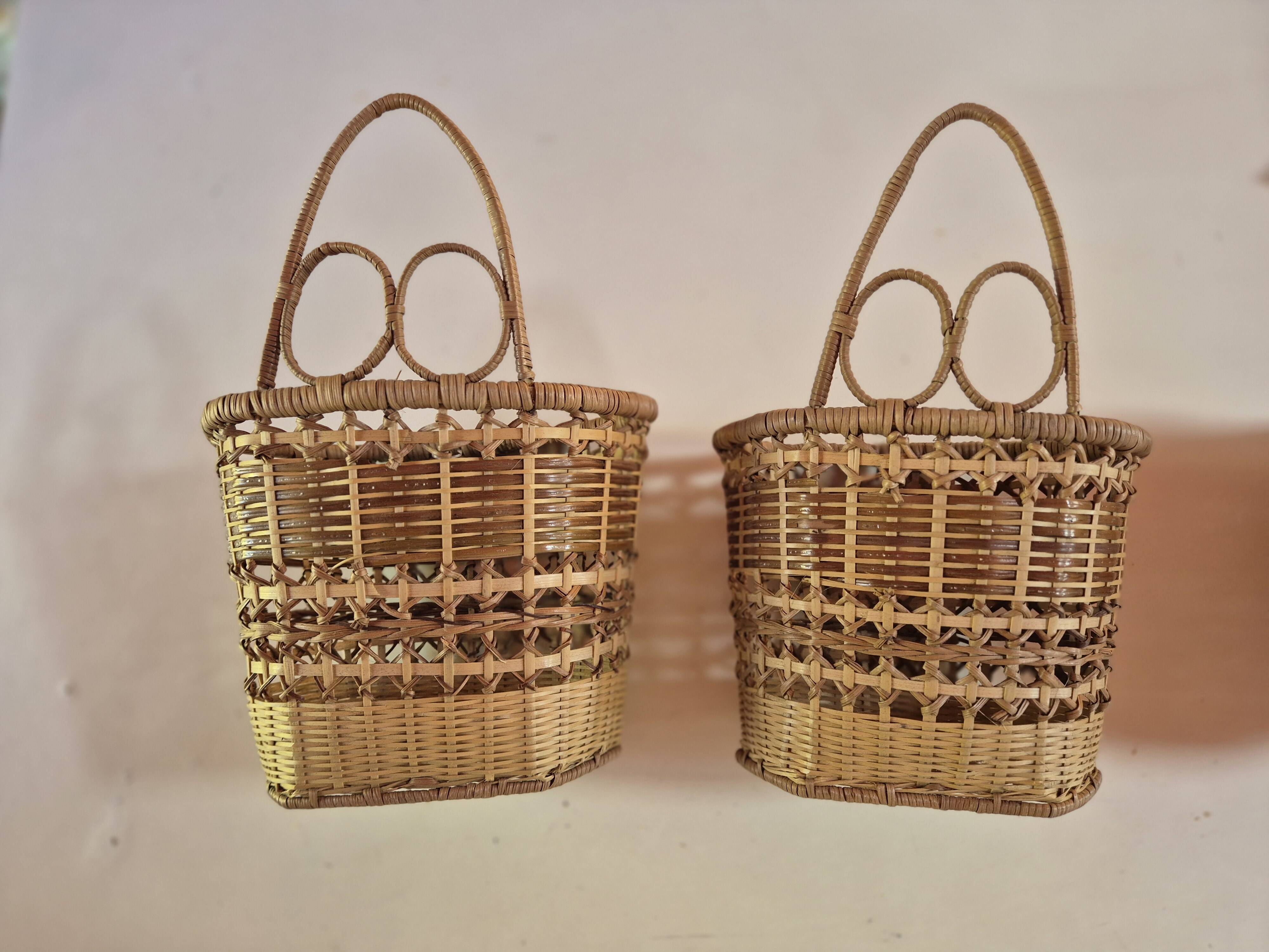 set of 2 vintage hanging rattan baskets