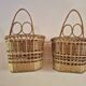 set of 2 vintage hanging rattan baskets