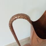 Old italian amphora vase in hammered copper