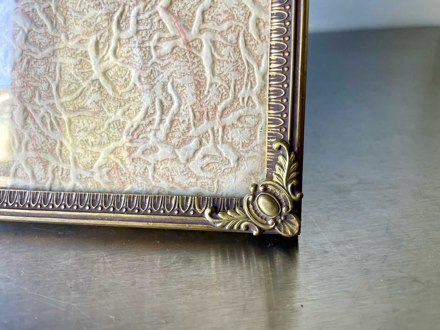 Metal vintage frame in gold colored brass