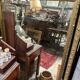 Large antique gilt mirror with scroll and shell decoration, 144 cm