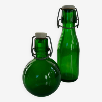 Duo of green bottles