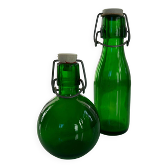 Duo of green bottles