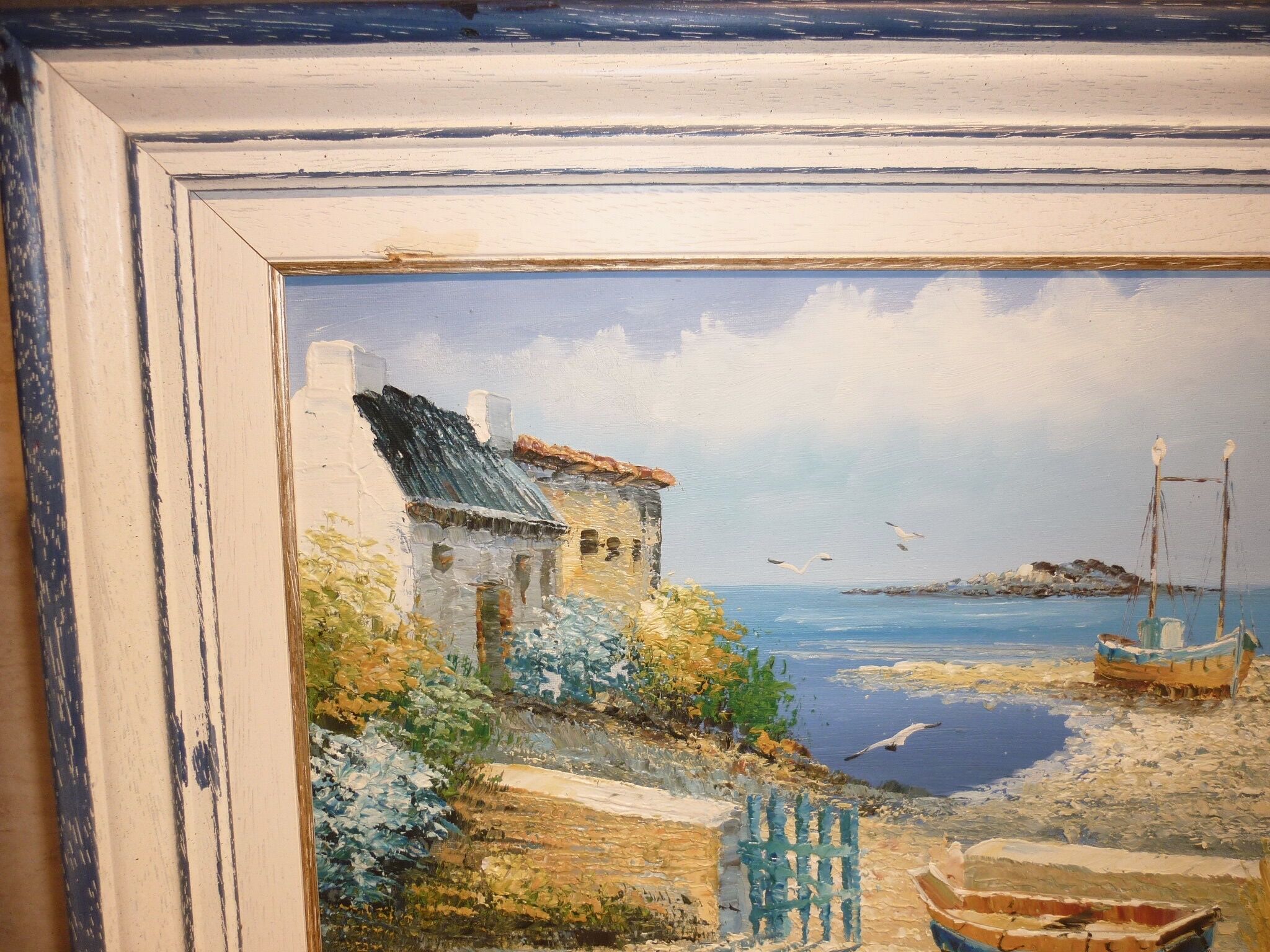Oil on canvas of a boat on the foreshore signed Yann 55X45