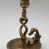 Antique bronze candlestick with dragon-shaped handle from the 17th century