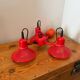 Three-lamp suspension in Memphis design style in red metal.