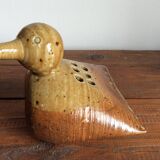 Sandstone bird flower pick