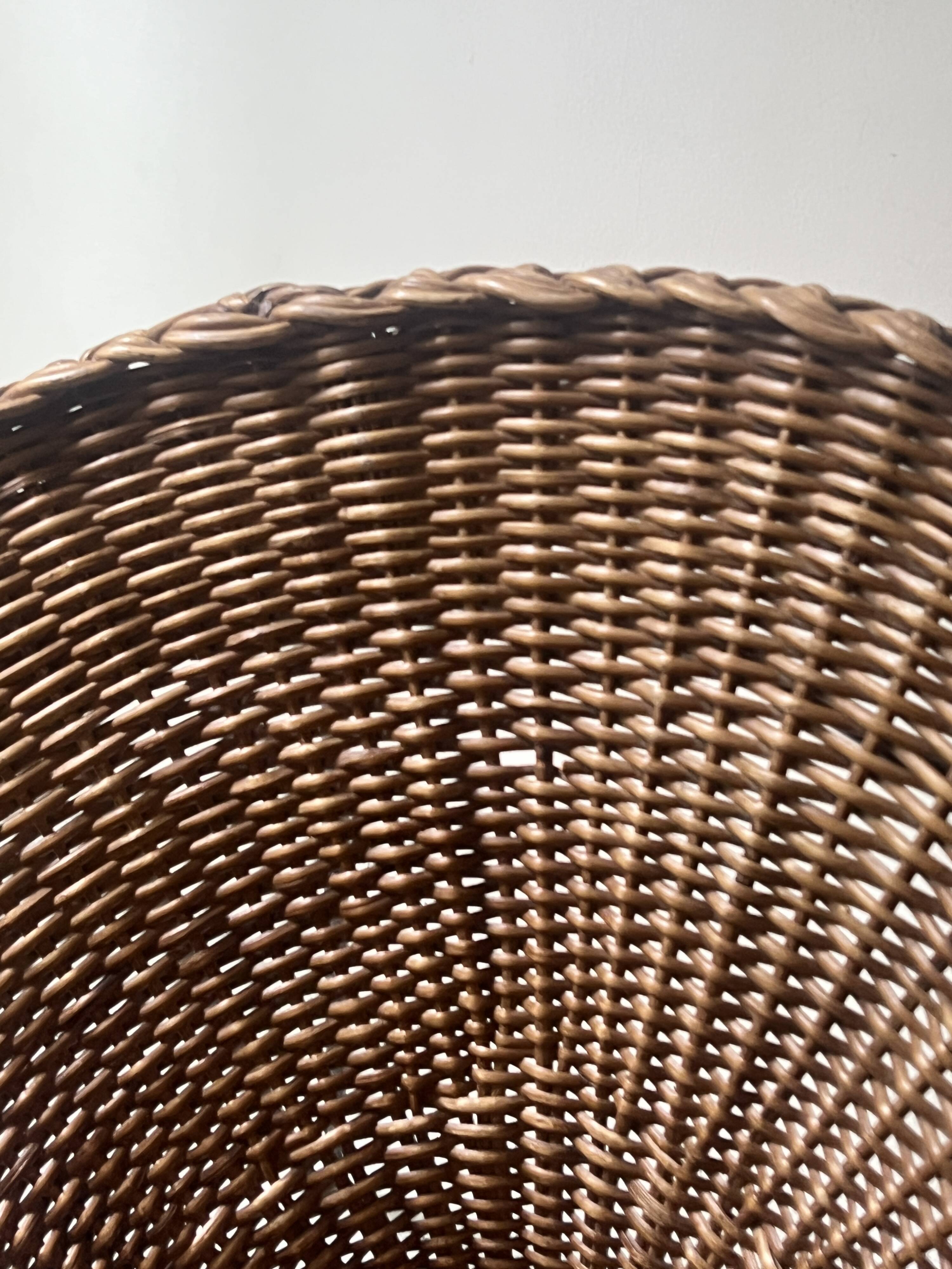 Italian sunflowers armchair in rattan and black metal, 1950s design.
