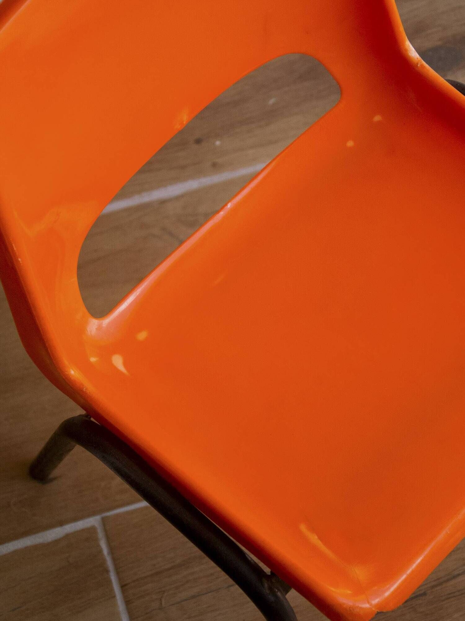 Vintage orange children's chair from the seventies.