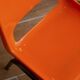 Vintage orange children's chair from the seventies.
