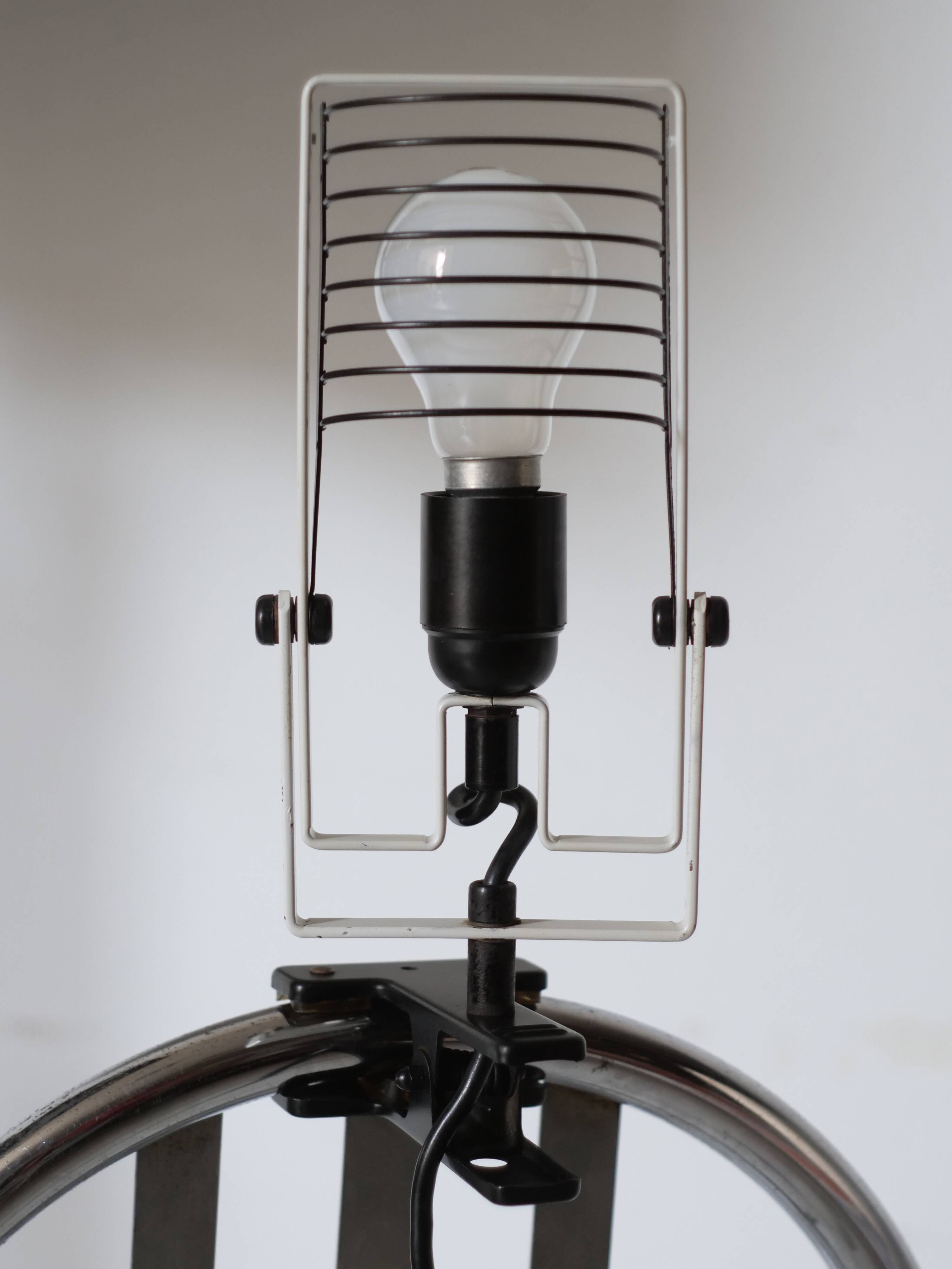 Artemide clamp lamp designed by Ernesto Gismondi model Sintesi