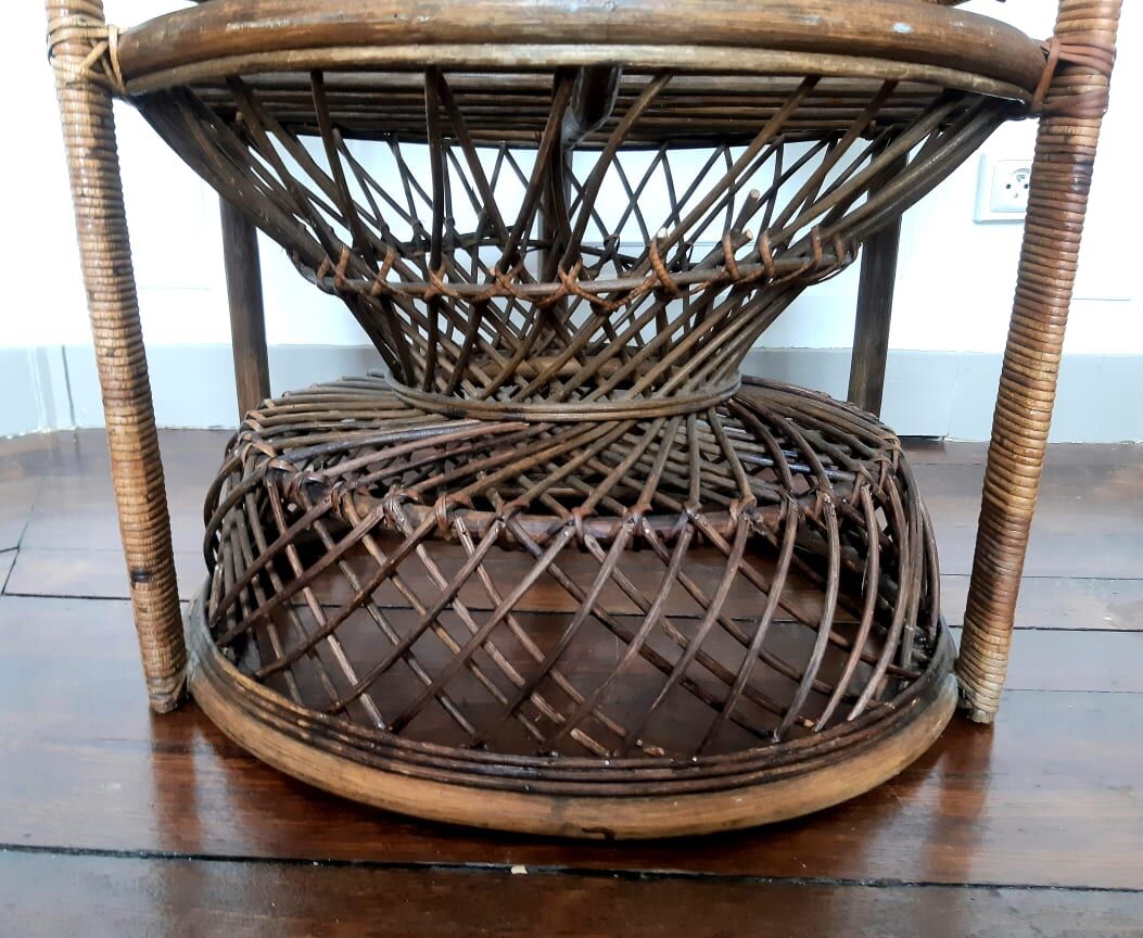Peacock rattan armchair, circa 1960