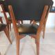 5 chairs in wood and black faux leather, Scandinavian style