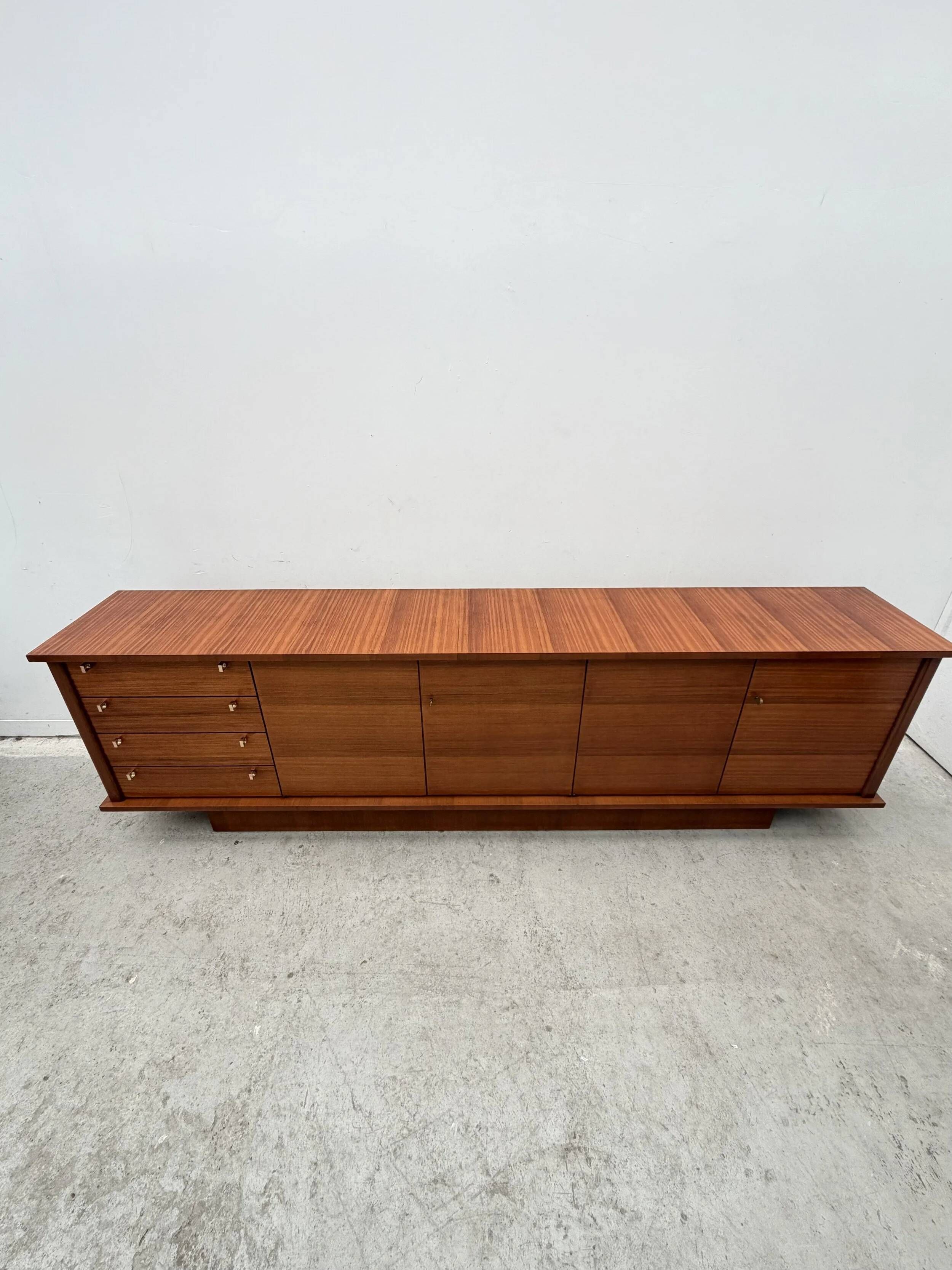 Enfilade by Robert DEBIEVE in mahogany veneer and brass, France 1950.