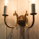 Old brass wall lamp with grapevines