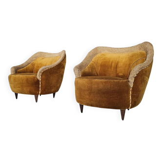 Pair of lounge chairs in the style of The Moderns Gio Ponti, Italy, 1950s.
