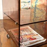 Smoked Plexiglas coffee table on wheels -