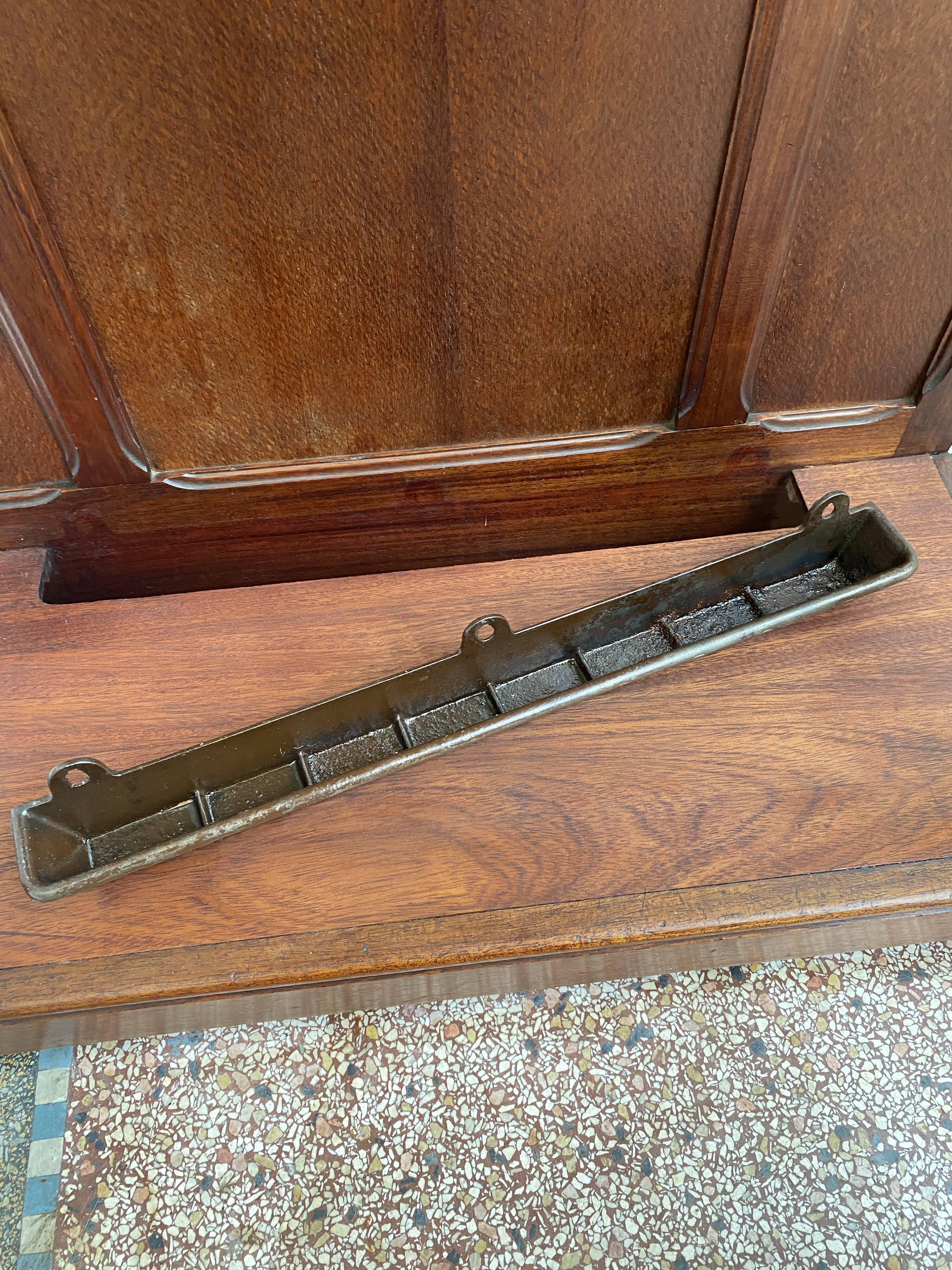 Antique wooden coat rack with mirror and shelf.