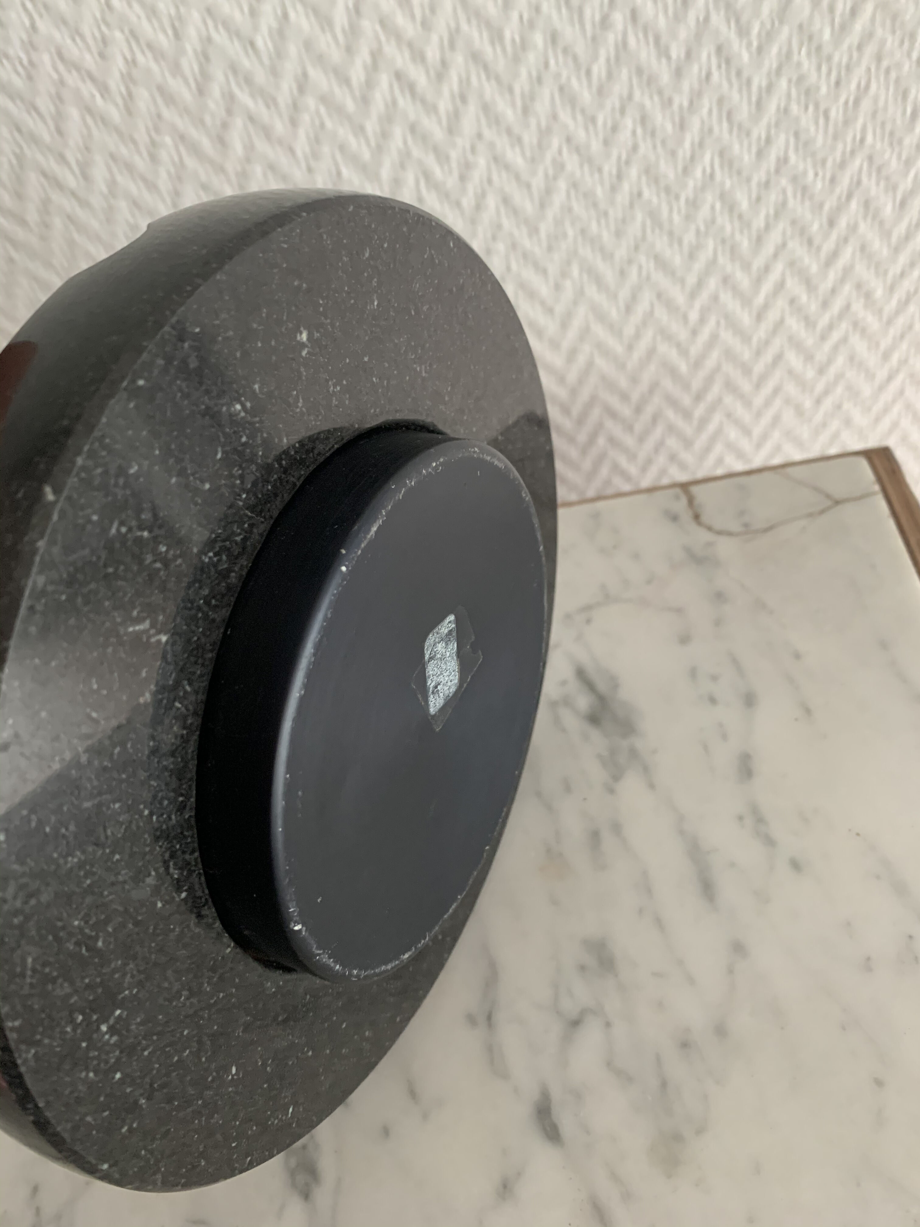 Grey-grey and black speckled marble round ashtray