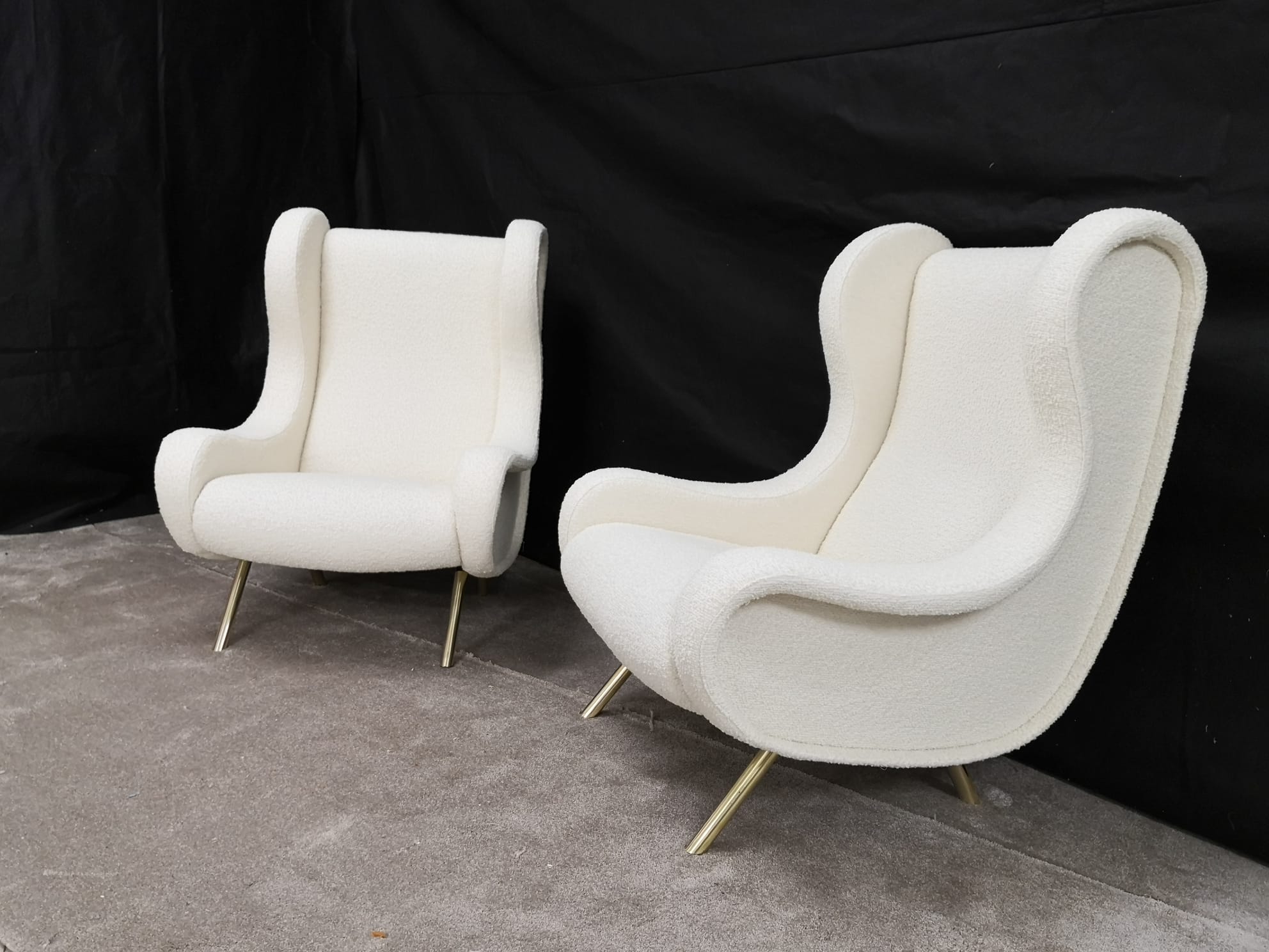 Pair of white buckle chairs