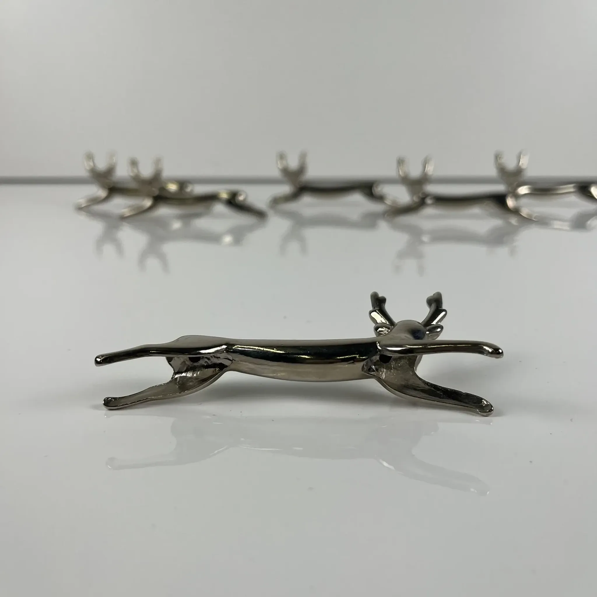 Set of 6 metal knife rests, "Deer / stag" model, 1980-90.