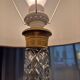 Pair of coloured table lamps, made of cut crystal and gilded bronze, in the Baccarat style.