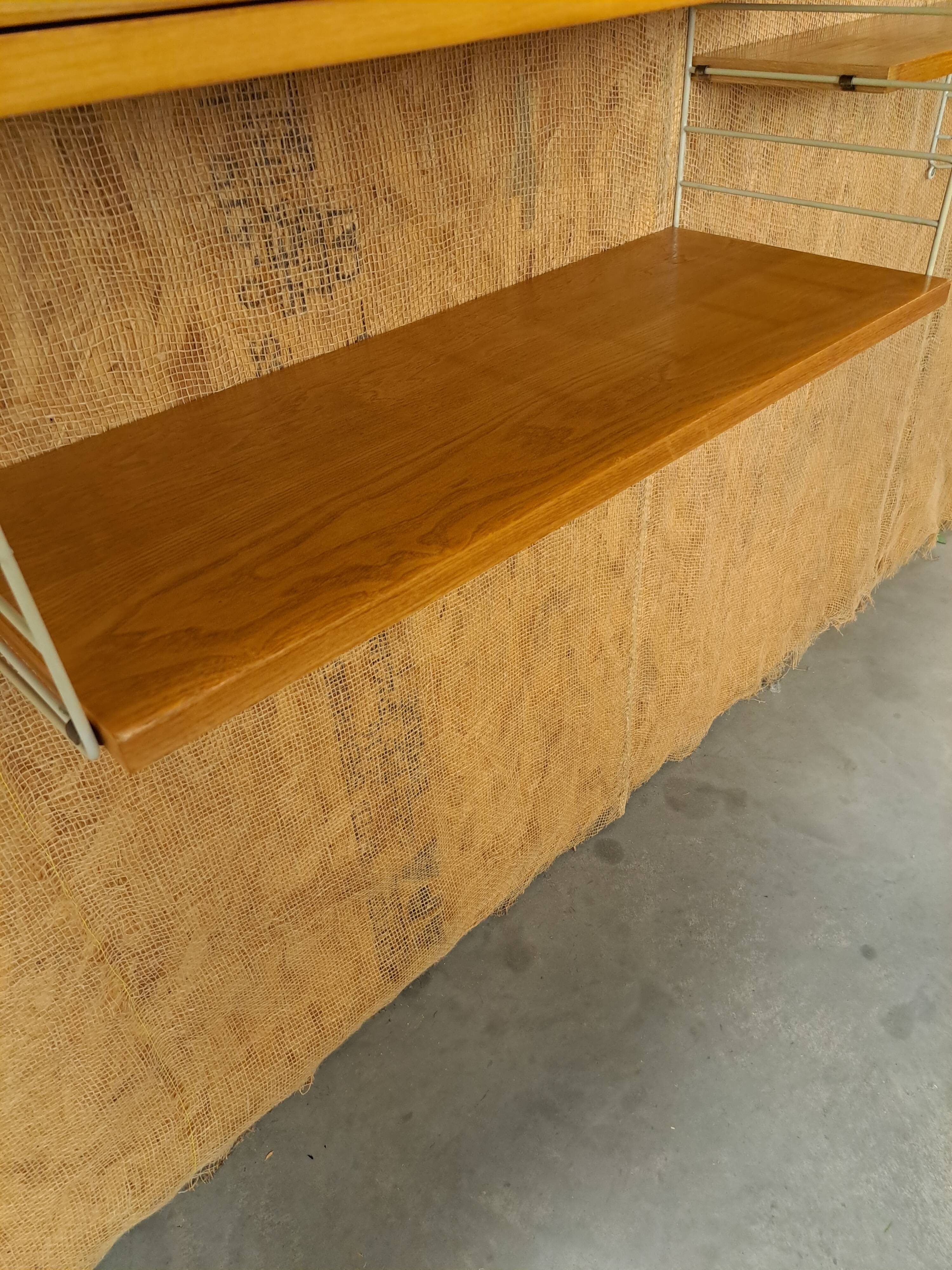 String modulair wandsysteem met kast en planken