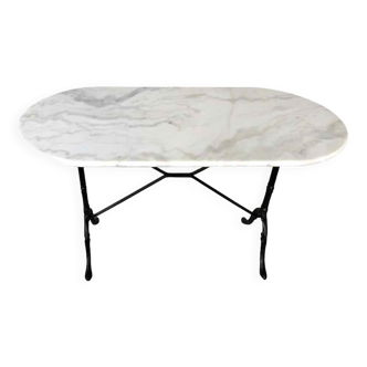 Oval marble and cast iron bistro table