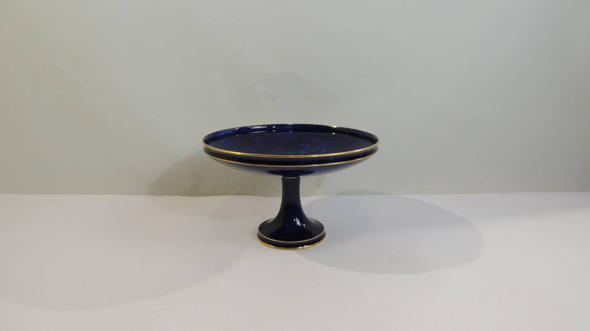 Sèvres porcelain cobalt blue footed bowl with gold rim – center