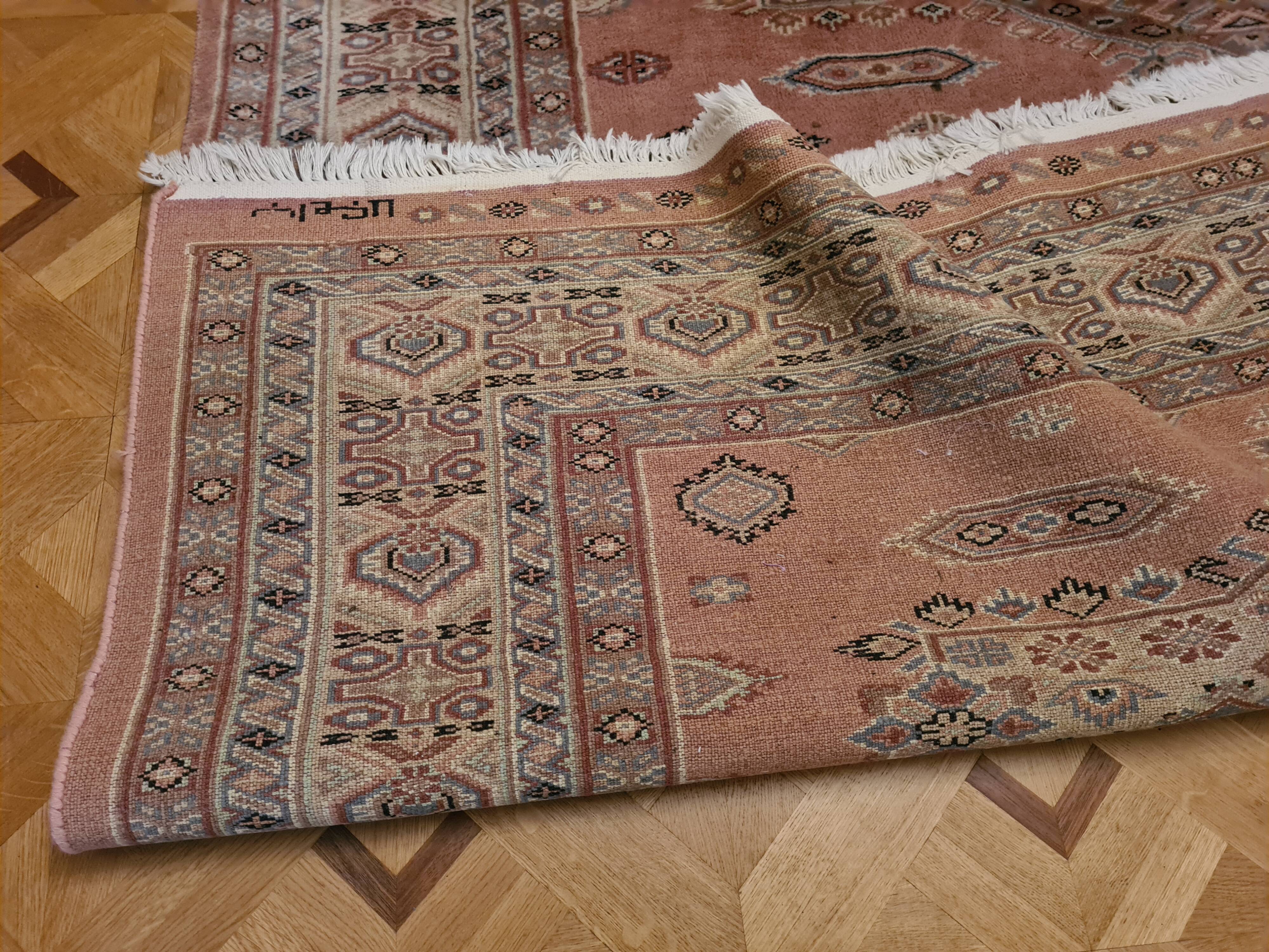 Handmade pink oriental carpet