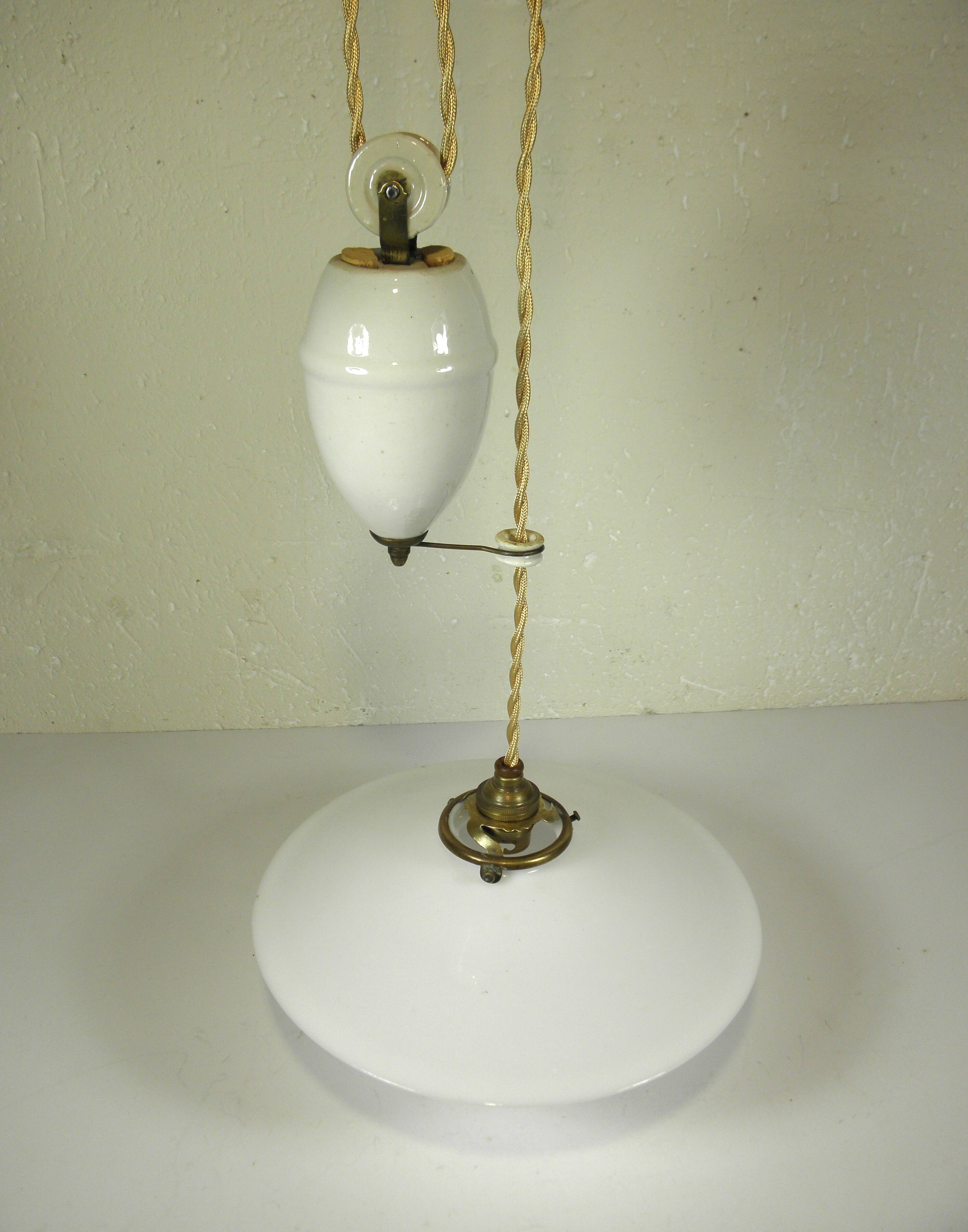 "Rise and fall" pendant light in opaline and porcelain