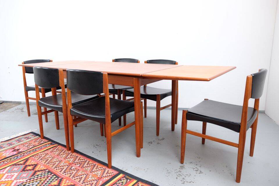 Teak dining table in retro vintage Danish style from the 60s-70s.