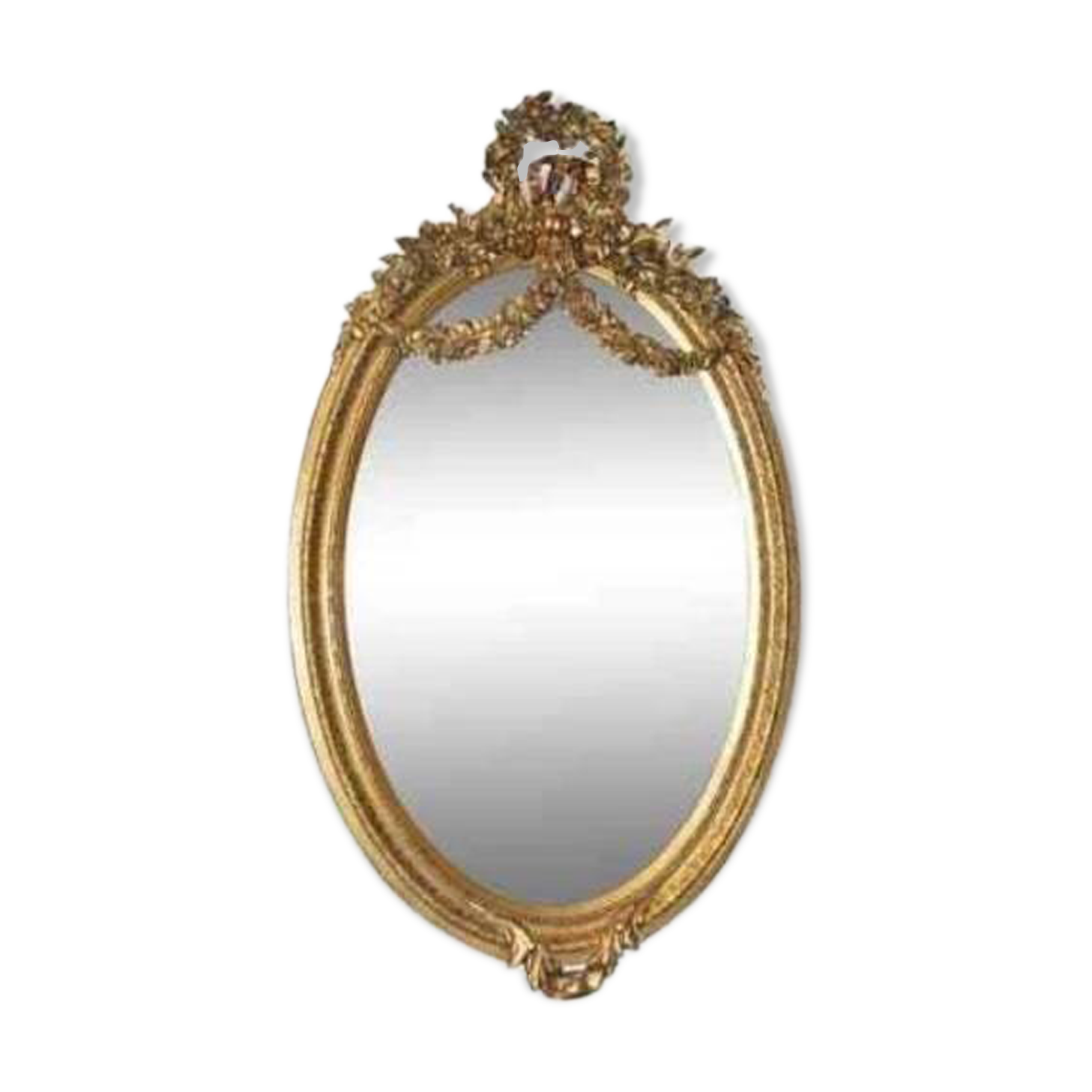 Oval mirror in Louis XVI style in wood and gilded stucco.