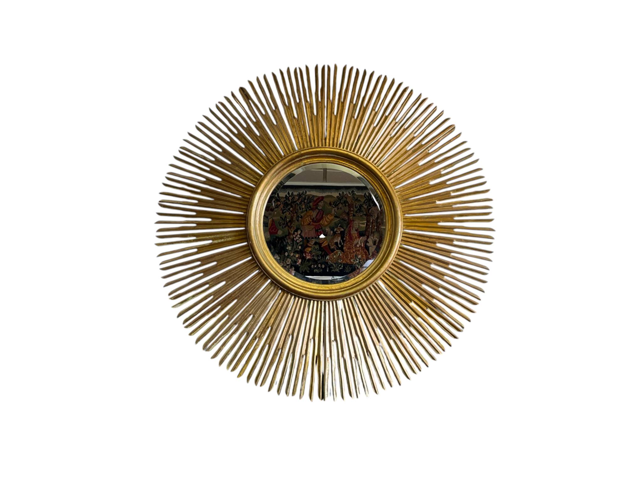 Large sunburst mirror with beveled glass and gilded wood from around 2010.