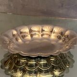 Oval-shaped polylobed metal cup with silver patina engraved with the letter D