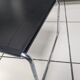 Table basse en métal chromé et tôle perforée