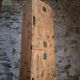 Antique French workshop cabinet in pine with compartments.