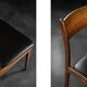 Mid-century modern vintage teak and vinyl dining chairs, 1960s, set of 4.