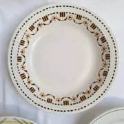 Shallow dish Gien orange and black model 456, Moulin des Loups yellow and grey.
