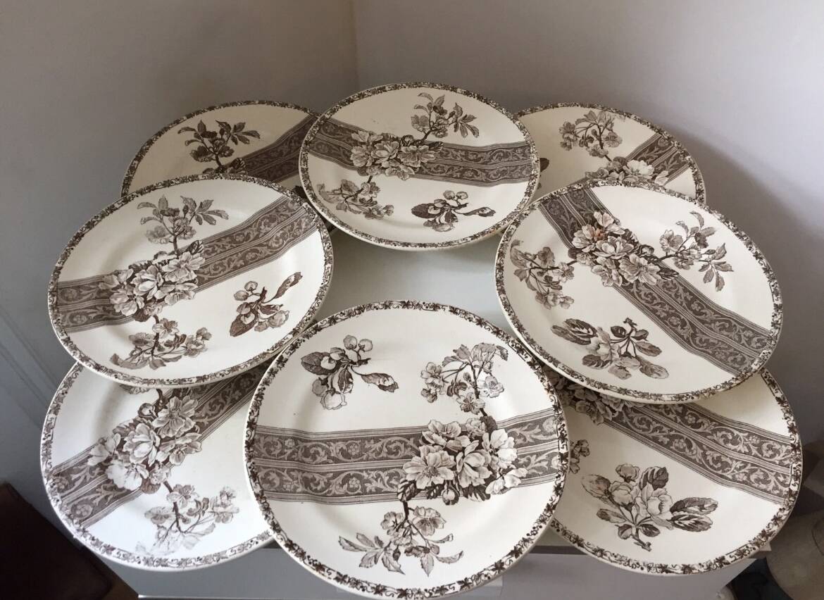 8 Terre de Fer dessert plates, 19th century