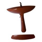 Vintage sink and its orange shelf