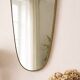 Miroir Art Déco en laiton de forme libre 78 cm