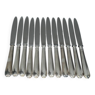 12 silver metal knives